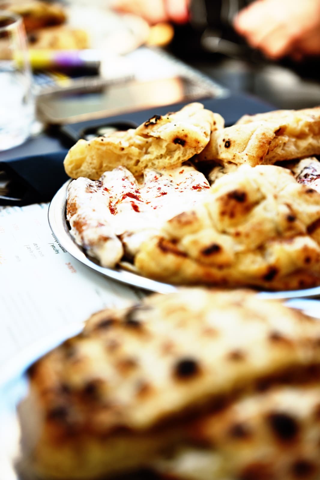 Lepinja, kajmak and ajvar — close-up.